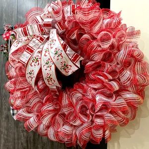 Wreath are 40.00 a piece and the plaid wreath is 35.00. Santa’s Mitts 3/15.00.